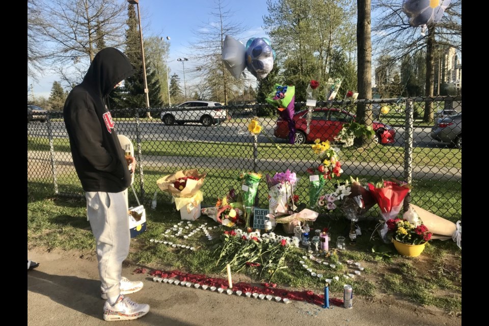 A memorial at the Town Centre Park basketball courts, where Bailey McKinney was killed on April 19.