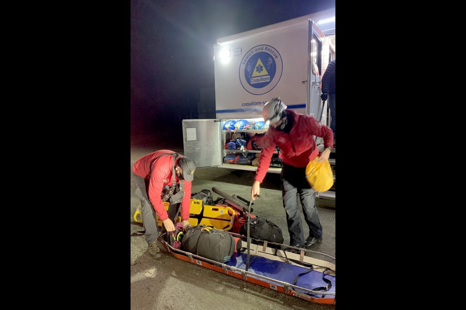 The stretcher and other gear is loaded onto the Coquitlam SAR mobile command unit after the training exercise ends.