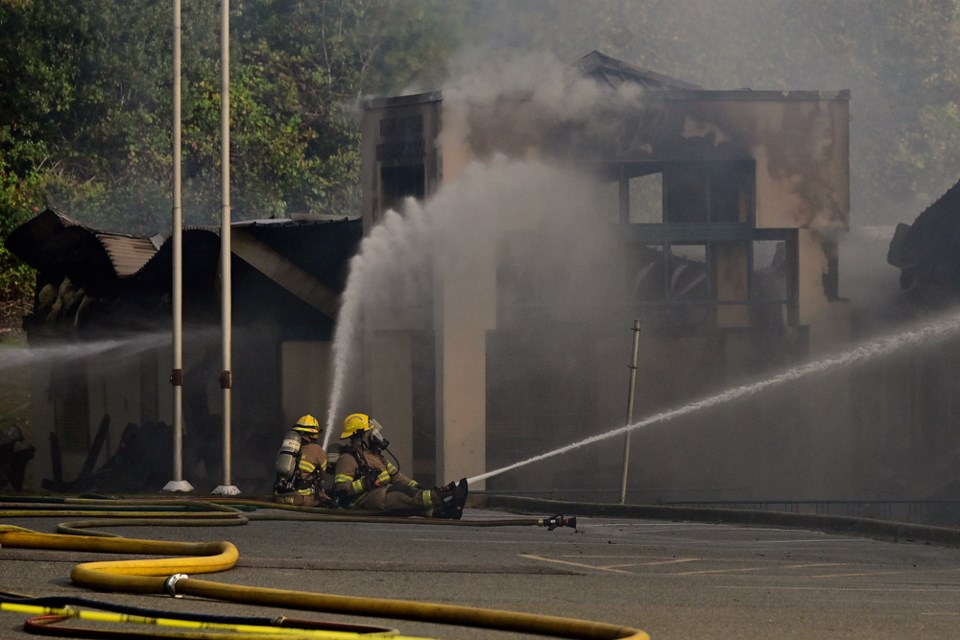 The Port Coquitlam fire department worked to put out a "suspicious" fire that fully engulfed Hazel Trembath Elementary on Oct. 14, 2023. 