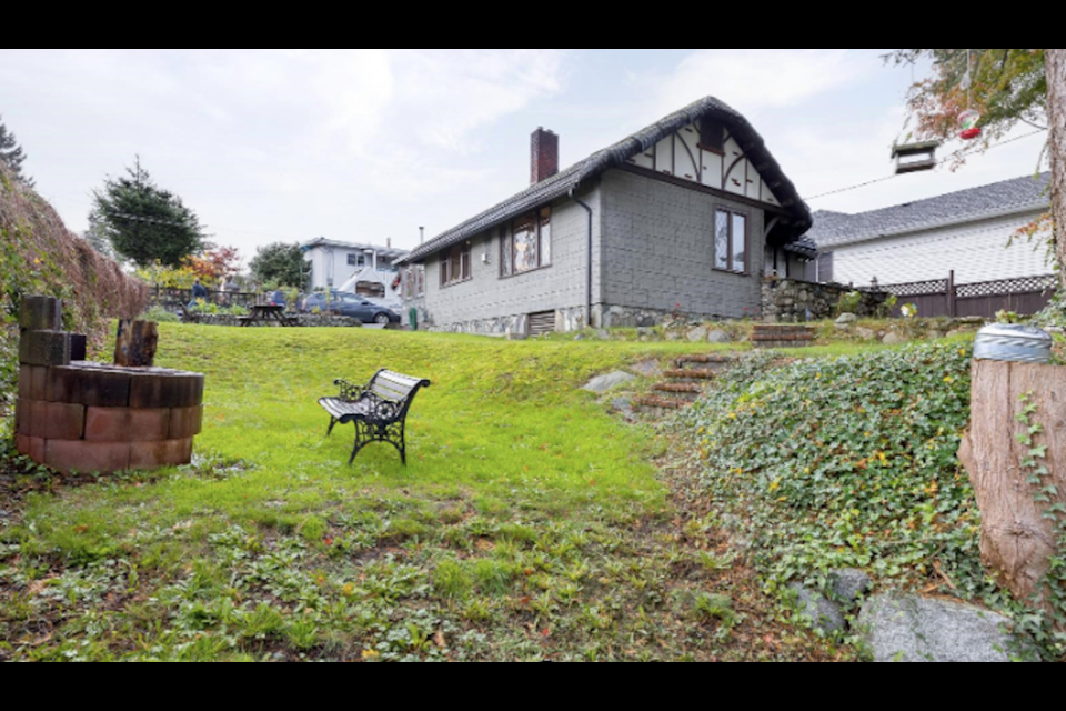 This adorable Tudor-style home built in 1945 recently sold on a lot with development potential.