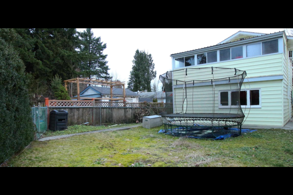 This Port Coquitlam home with a back yard sold recently for $970,000.