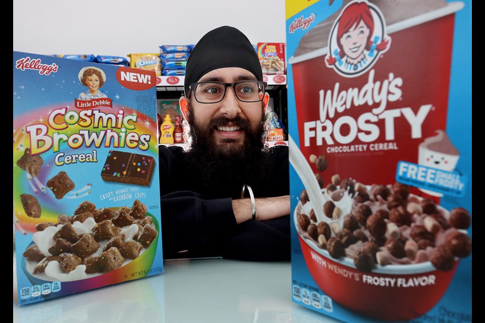 Sukh Duggal shows off some of the unique snacks from all over the world available at his Port Coquitlam convenience store. | Mario Bartel, Tri-City News