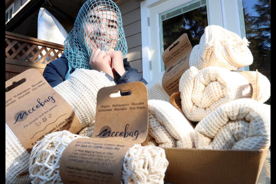 Paxton Moore, 12, has started his own business selling and distributing organic cotton shopping bags.