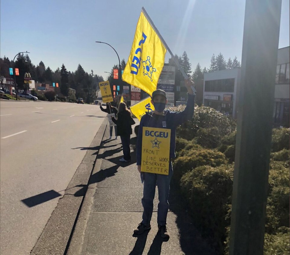 BC liquor store workers protest in Coquitlam