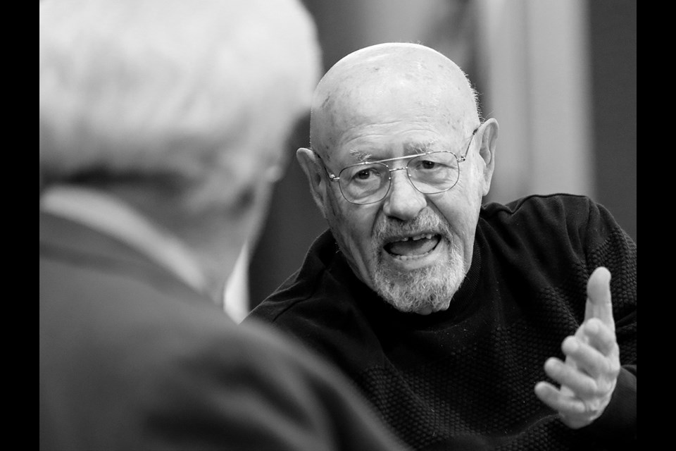 Holocaust survivor Janos Benisz shares some of his memories of the Strasshauf concentration camp during the 14th annual symposium on the Holocaust put on by School District 43.