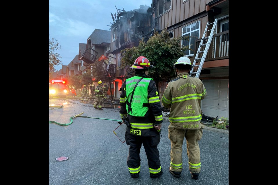 Firefighters from Port Moody and Coquitlam responded to an early-morning townhouse fire in the Heritage Woods neighbourhood on Monday.