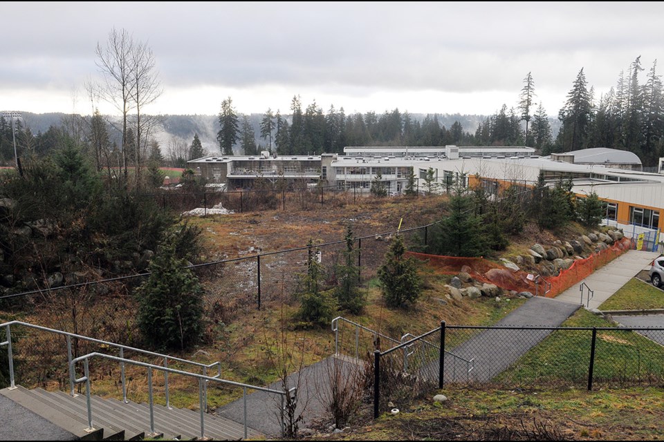 A failing septic field above Eagle Mountain Middle School is being decomissioned after the recent completion of a hookup from the Anmore Green Estates housing complex to the Metro Vancouver regional sewer system.