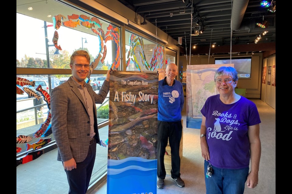 [From left to right] Alex Code, manager and curator of PoCo Heritage Museum and Archives along with Jeff Rudd and Shelley Livesey of Maple Creek Streamkeepers with the new exhibit A Fishy Story. | Diane Strandberg, Tri-City News