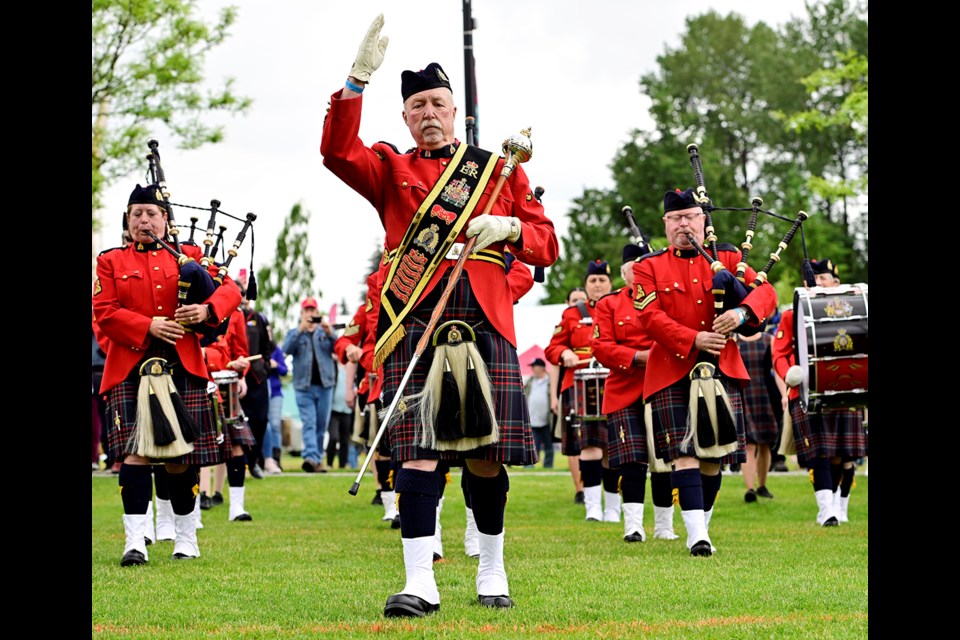 RCMP E Division pipe band at ScotFestBC at Town Centre Park.
