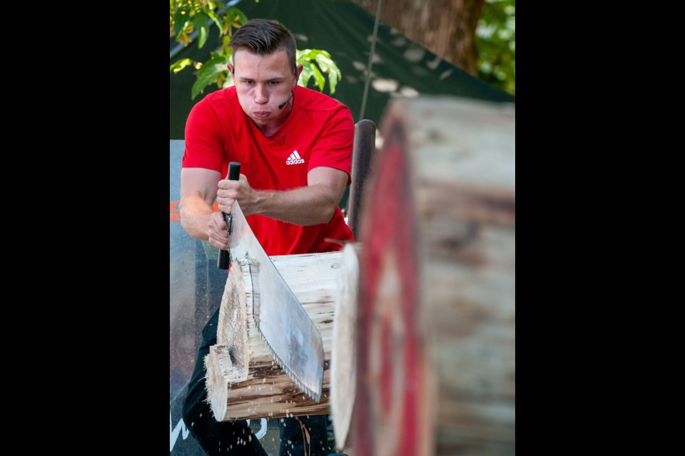 The Laughing Loggers get serious during a saw-off at Port Moody's Canada Day and Golden Spike Days events at Rocky Point Park.