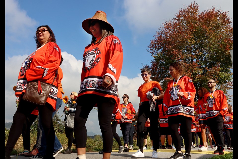 More than 100 people walked with Kwikwetlem elders at the Walk for Reconciliation down Colony Farm Road on Sept. 29, 2022.