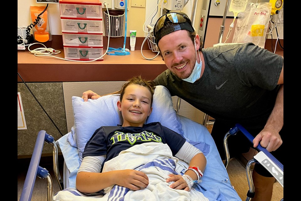 Port Moody teen Hartley Renard was sent to Eagle Ridge Hospital with a broken leg the same day her parents were participating in the Ryan and Lucas Johansen Charity Golf Classic. She was the first-ever patient in the trauma ward of the hospital's ER expansion, and  Ryan (left) went to visit her.