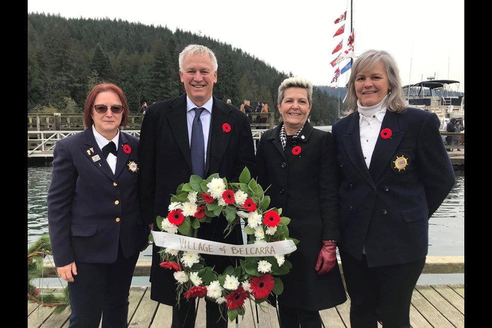 Port Moody-Coquitlam MP Bonita Zarrillo (2nd right) with Belcarra Mayor Jamie Ross (2nd left) participate in the village's Remembrance Day 2022 ceremony.