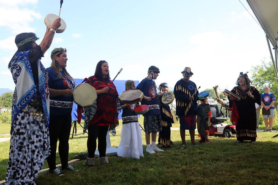 Kwikwetlem First Nation members host a drum performance ahead of the official renaming ceremony for ƛ̓éxətəm (pronounced tla-hut-um) Regional Park and Road from Colony Farm on July 1, 2023.