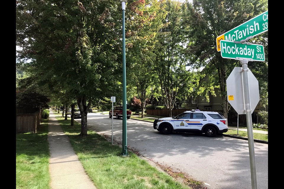 Coquitlam RCMP tape off McTavish Court where at the end of the cul-de-sac, a fire took place Sept. 8, 2021, and a deceased person was discovered.