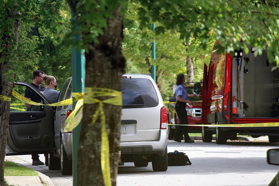 Coquitlam RCMP tape off McTavish Court where at the end of the cul-de-sac, a fire took place Sept. 8, 2021, and a deceased person was discovered.