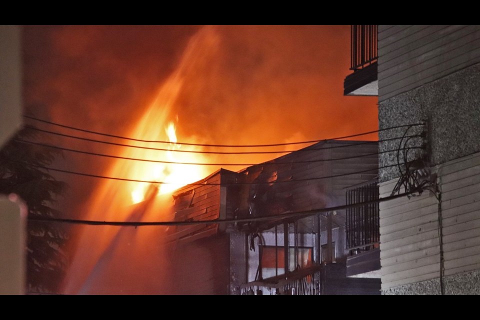 Dozens of residents were displaced and moved into the Port Coquitlam Community Centre following a large apartment complex fire on Wilson Avenue the night of June 25, 2022.