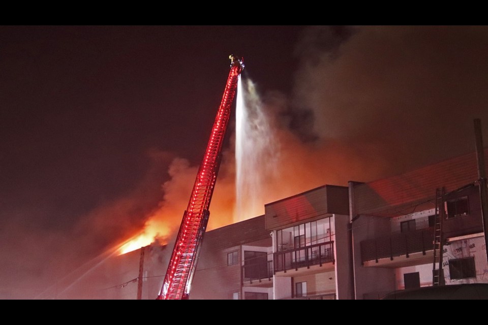 Dozens of residents were displaced and moved into the Port Coquitlam Community Centre following a large apartment complex fire on Wilson Avenue the night of June 25, 2022.