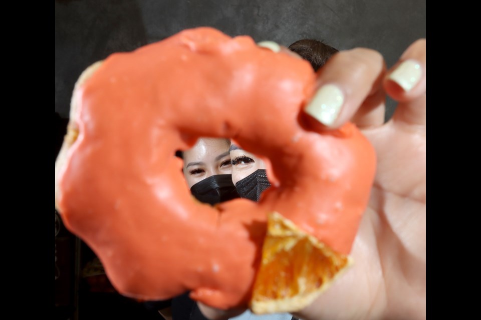 Kathy Nguyen, left, and Maria Adato, quit their corporate jobs to start their own doughnut bakery, Holy Mochi, in Port Coquitlam.