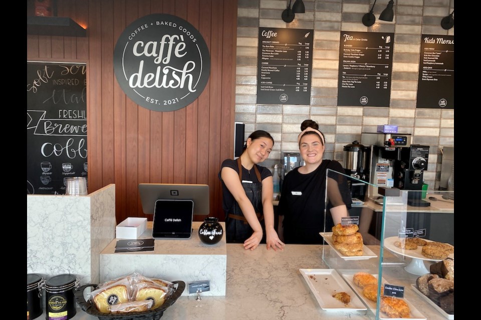 Yeni Oh and Ali Picco serve up customers at Caffé Delish in Port Coquitlam, which opened in June, 2022.