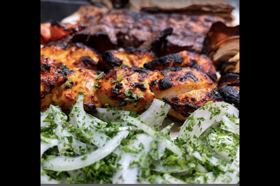 Grilled meats and onions served up middle eastern style at Ayam Zaman, a new restaurant in Coquitlam.
