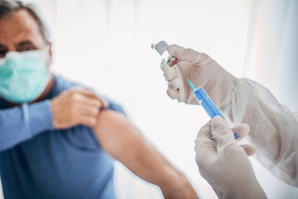 A senior male is about to receive a COVID-19 coronavirus vaccine. - Photograph via Getty Images