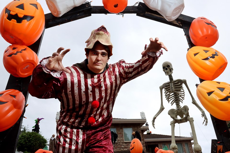 Coquitlam student Macarthy Whyzel is putting the final touches on the elaborate Halloween display he's erected at his family's home for the past five years to raise money for local charities.