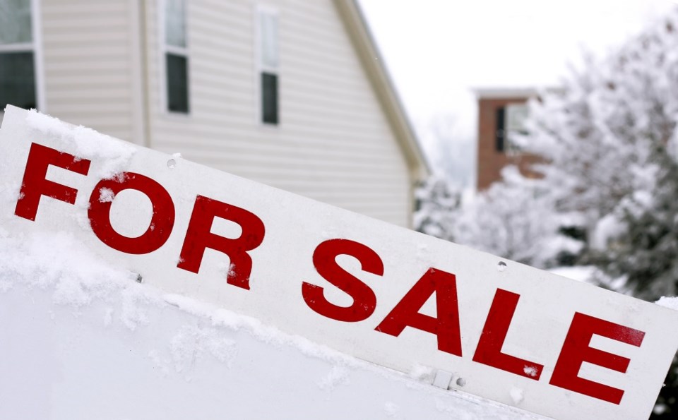 for-sale-sign-in-the-snow-getty-images