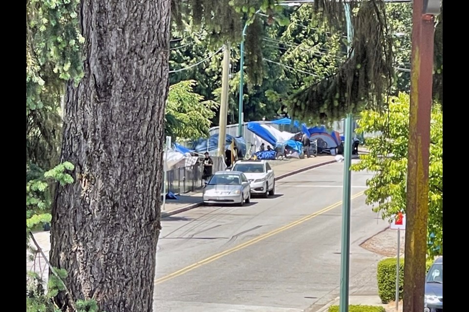 A tent encampment outside 3030 Gordon Avenue shelter in Coquitlam, before it was removed.