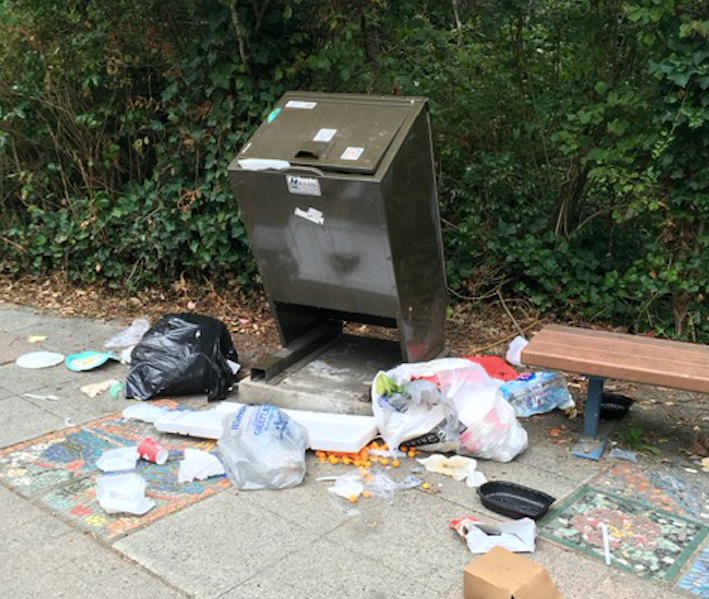 Garbage left outside a bin in Port Coquitlam.