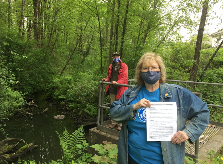 Sandy Budd and Jeff Rudd, of the Maple Creek streamkeepers in Port Coquitlam, are happy with a plan to improve the creek but wonder why it took so long.