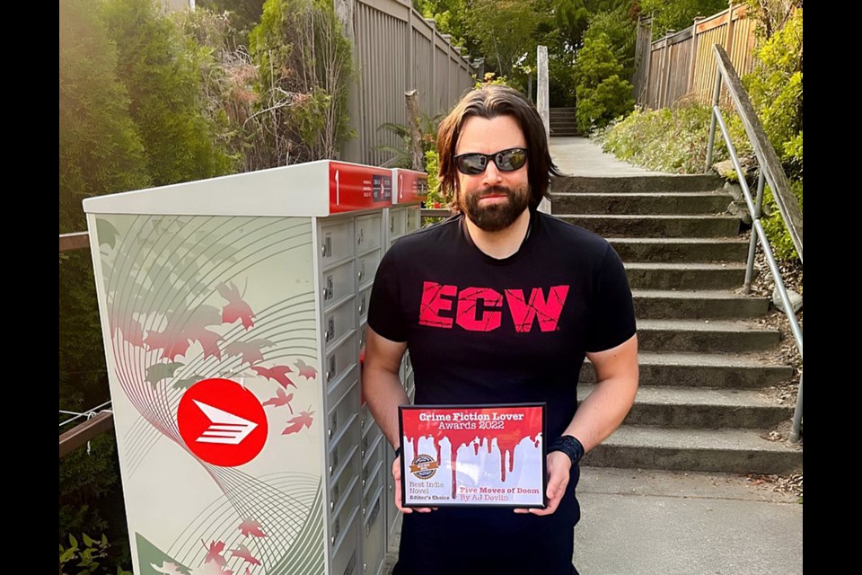 A.J. Devlin at his Port Moody mailbox after receiving the UK-based Crime Fiction Lover Editors' Choice Award for Best Indie Novel of 2022.