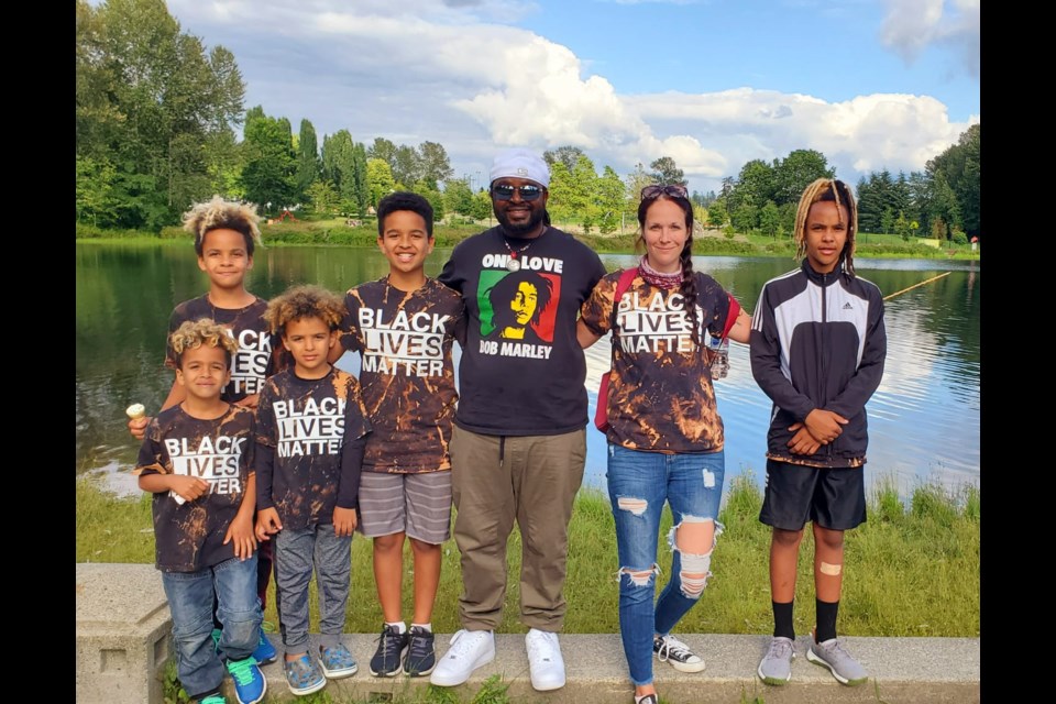 Carli Travers and her husband Robert Birungi with their five biological sons. The family now calls Port Coquitlam home.
PHOTO VIA CARLI TRAVERS