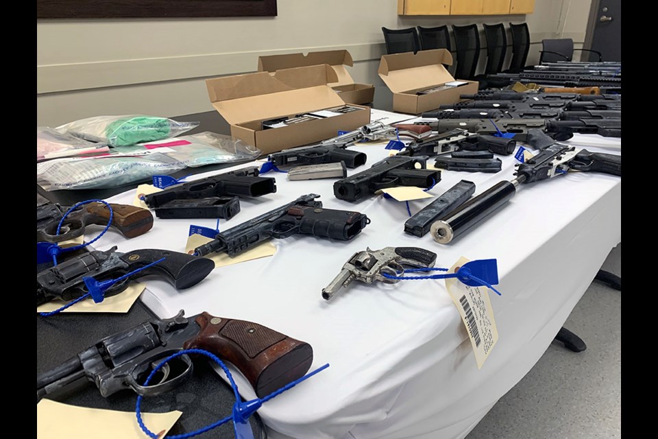 Coquitlam RCMP unveil a large seizure from a trafficking investigation from 2021 consisting of drugs, cash, firearms and luxury vehicles and led to the arrest of five local residents as part of efforts in curbing Lower Mainland gang conflict.