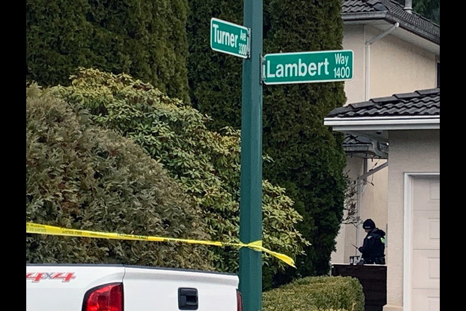 Homicide police are investigating an 'isolated' Coquitlam shooting that killed a woman on Dec. 8, 2022, at Lambert Way and Turner Avenue.