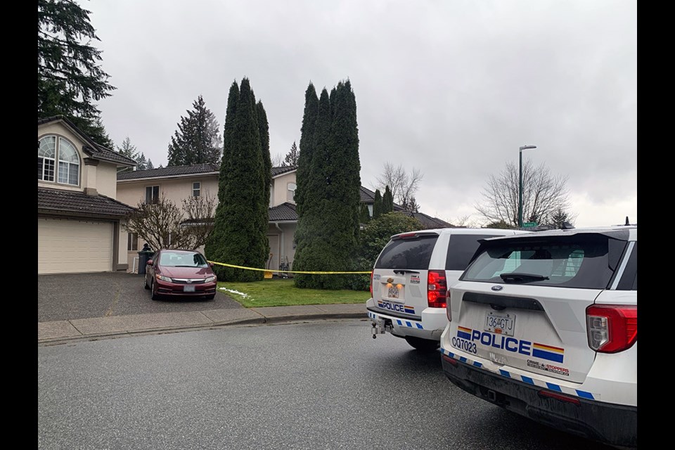Homicide police are investigating an 'isolated' Coquitlam shooting that killed a woman on Dec. 8, 2022, at Lambert Way and Turner Avenue.