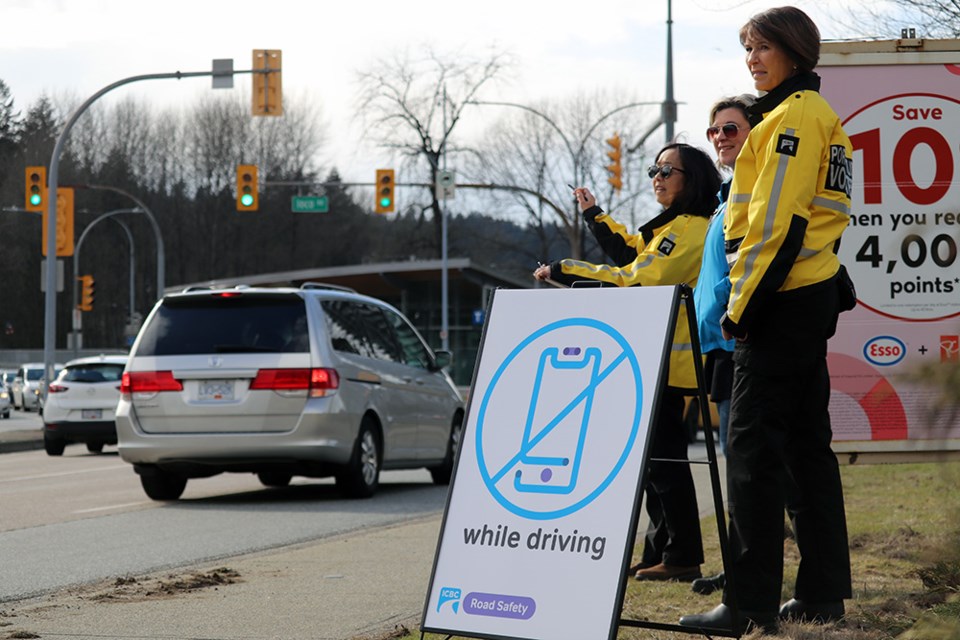 Port Moody police (PMPD), ICBC and volunteers were looking for distracted drivers at Ioco Road and Barnet Highway (7A) on March 8, 2023, as part of a month-long campaign and constant reminder for local drivers to "leave the phone alone."