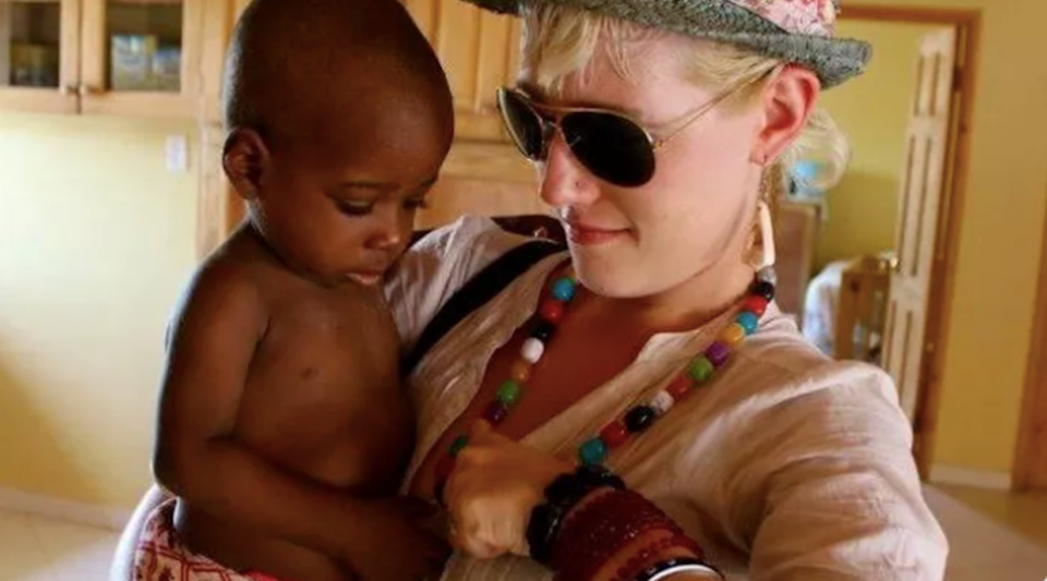 stephanie-leigh-forster-holds-haitian-child