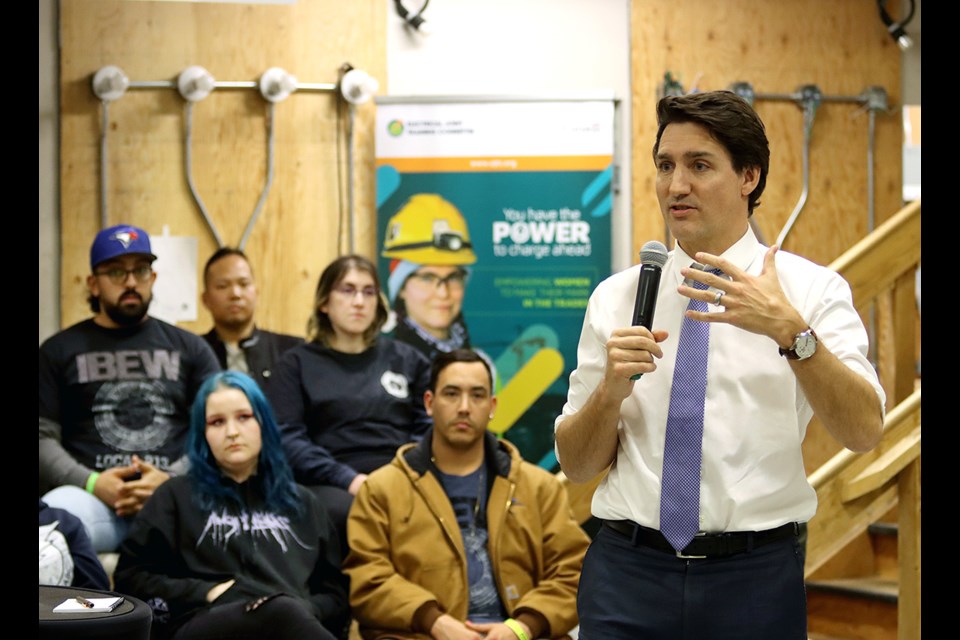 Prime Minister Justin Trudeau speaks to electricians and apprentice electricians at a special town hall meeting at the Electrical Joint Training Centre in Port Coquitlam on Wednesday.