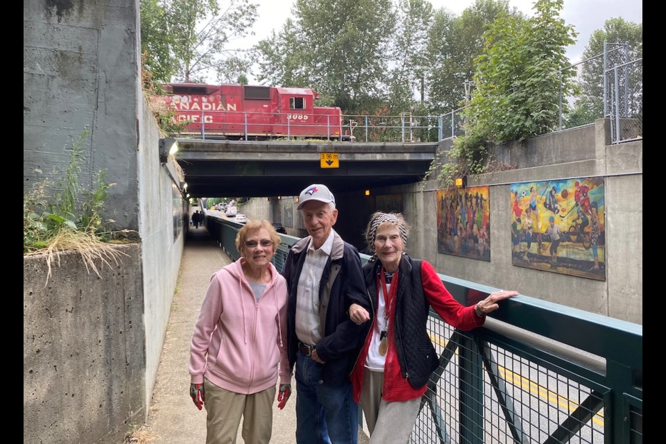 Port Coquitlam seniors Helen Zarelli, John Hurtubise and Gail Peneff want Port Coquitlam to take action on cyclists who refuse to dismount in the narrow Shaughnessy Street underpass.