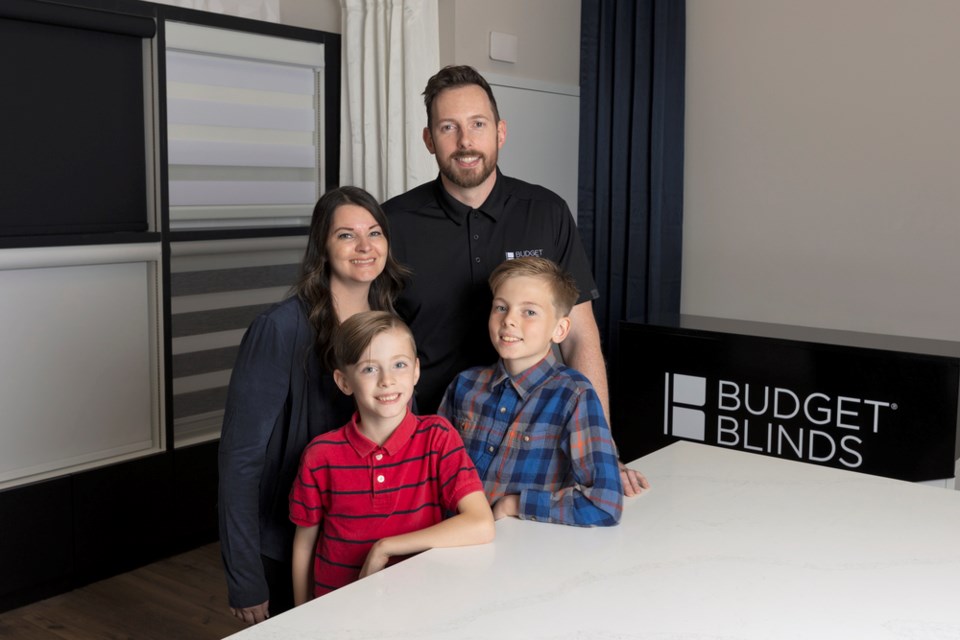 Budget Blinds owners Clay and Lacey Tierney with their children.
