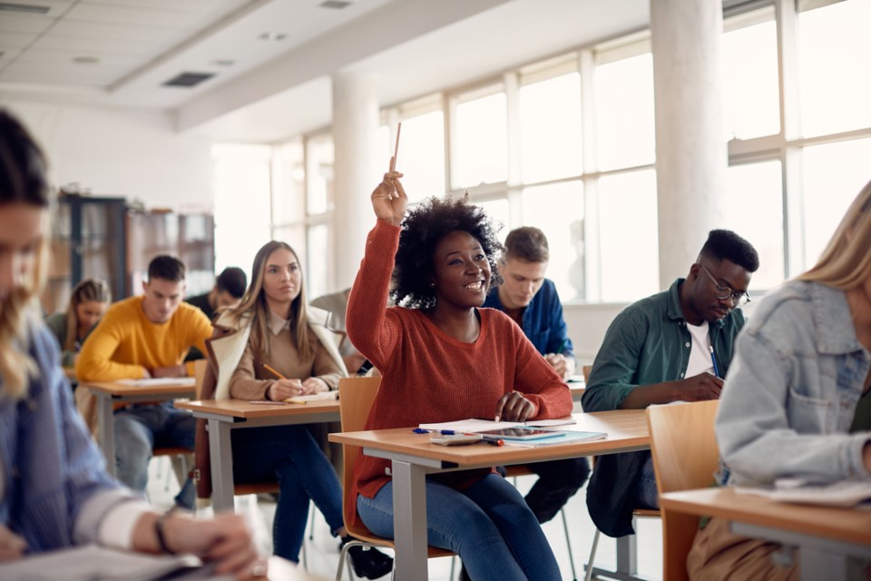 coquitlam-continuing-education-raised-hand-istock