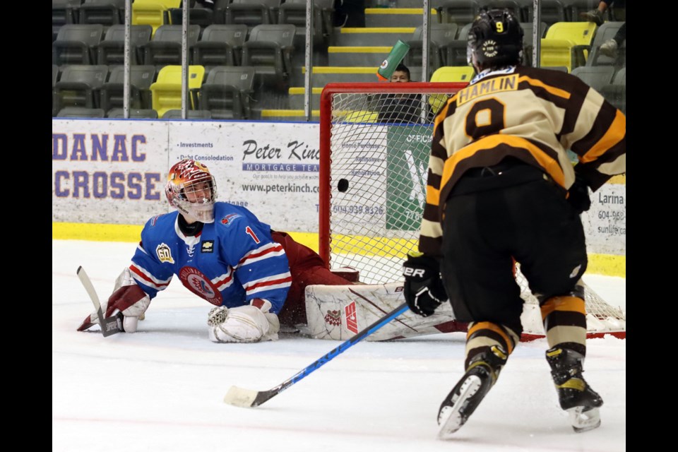 Coquitlam Express forward Ray Hamlin scores his third goal of the night on Chilliwack Chiefs goalie Grant Riley n the second period while his team is shorthanded in their BC Hockey League game, Friday at the Poirier Sport and Leisure Complex.