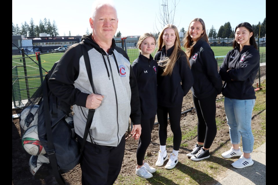 Centennial Centaurs senior girls soccer coach Larry Moro and his leadership group of players, including Kate Smith, Jessica Fong, Dani Coss and Sarah Caravatta, will be playing their first true home matches in more than 20 years when the school opens its new turf field in April.