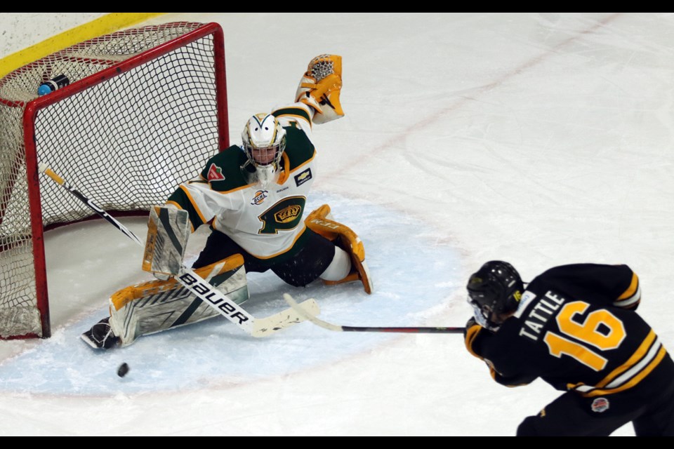 Powell River Kings goalie Thomas Wardle makes a toe save on Coquitilam Express forward Ryan Tattle in the second period of their BCHL pod season game at the Scotia Barn in Burnaby on Monday.