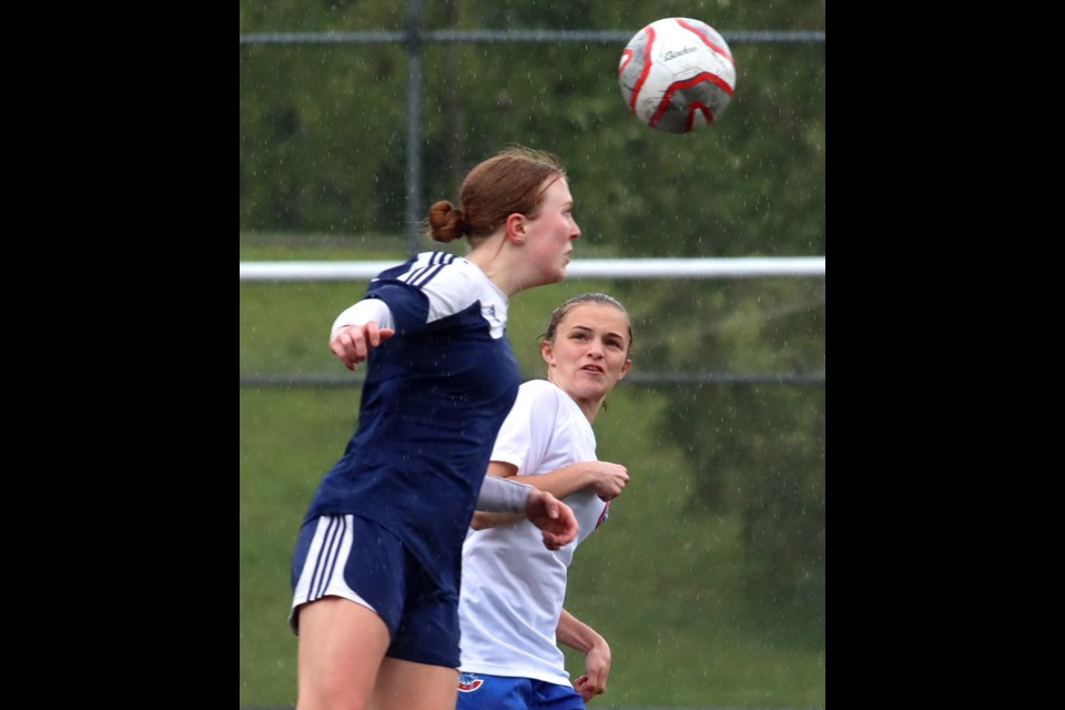 Senior Kaitlan Cerney (right) is a captain of this year's Centennial Centaurs senior girls soccer team which will be looking to defend its provincial AAA high school championship under the leadership of a new head coach, Kevin Comeau.