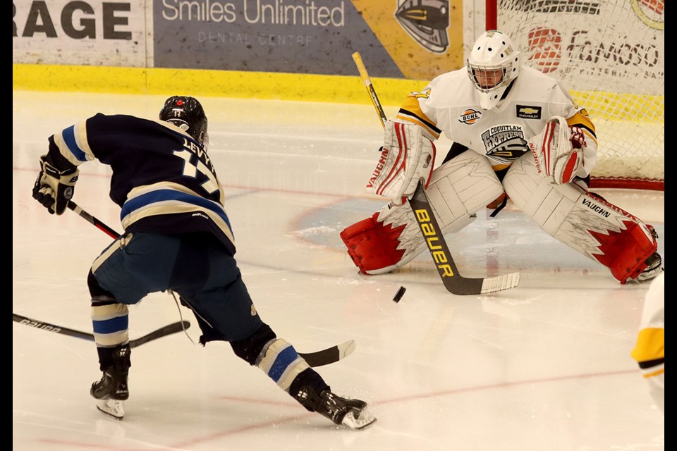 Langley Rivermen forward Vitaly Levyy beats Coquitlam Express goalie Brady Smith to open the scoring just 16 seconds into their BC Hockey League game, Wednesday afternoon at the Poirier Sport and Leisure Complex.