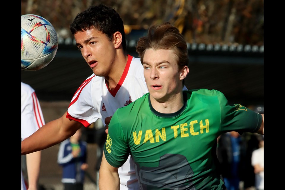 Terry Fox Ravens' forward Matthew Marrone battles a  Van Tech defender for control of the ball in the first half of their BC High School AAA boys soccer provincials match, last Thursday at the Burnaby Lake Sports Complex West. Fox won the match, 2-0, and went on to finish third in the tournament.