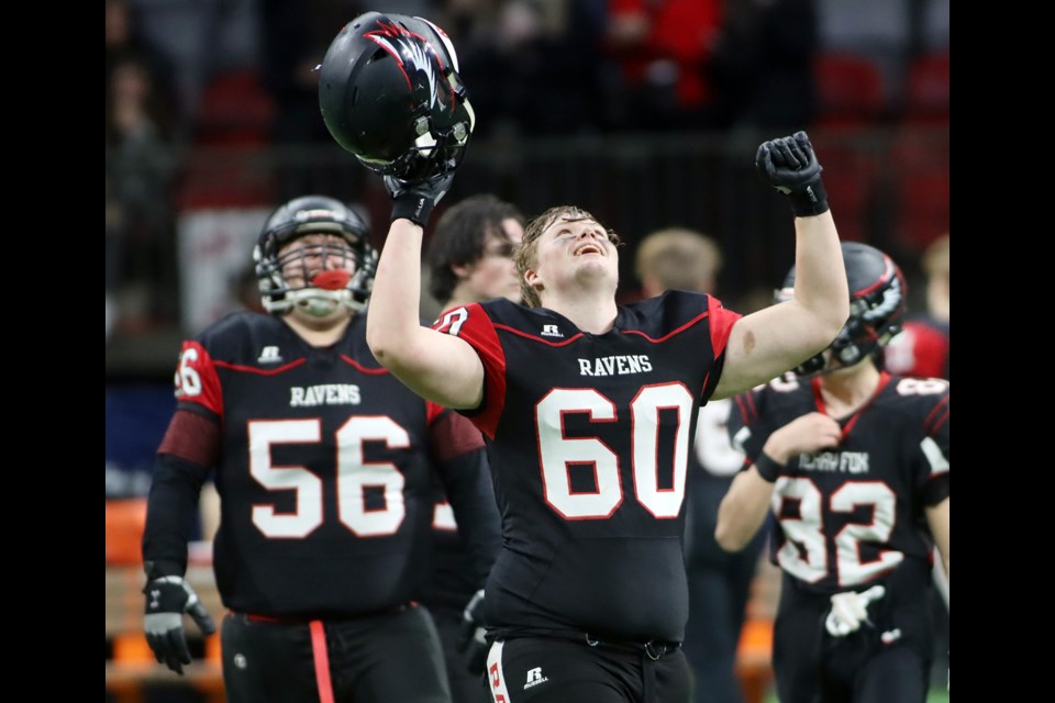 Terry Fox Ravens defensive lineman Kaiden Exner celebrates his team's 27-12 victory over the Notre Dame Jugglers Saturday at BC Place Stadium to advance to the BC Secondary Schools Football Association's Subway Bowl championship next week against the G.W. Graham Grizzlies from Chilliwack.