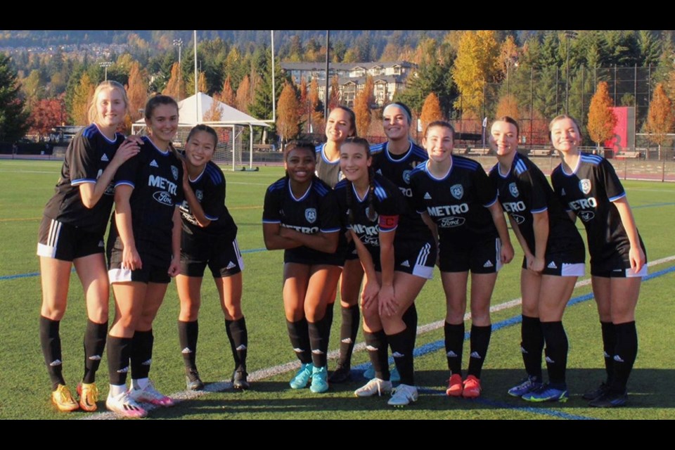 Port Coquitlam's Alyssa Clark (2nd left) seen here on Coquitlam Metro-Ford Soccer Club.
